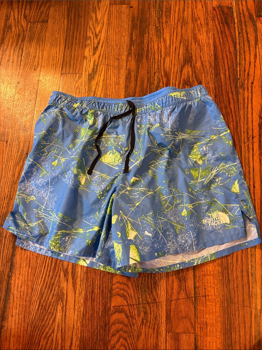 🎉NWOT! The North Face Blue Swim Trunks with Yellow-Green Print!